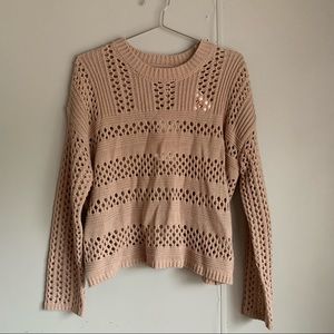 Punched hole sweater